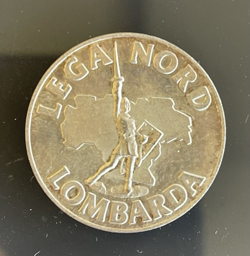 Riproduzione moneta lire - 5,